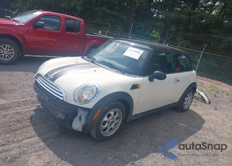 2010 Mini Cooper z USA, uszkodzony, nr VIN WMWMF3C50ATZ26274